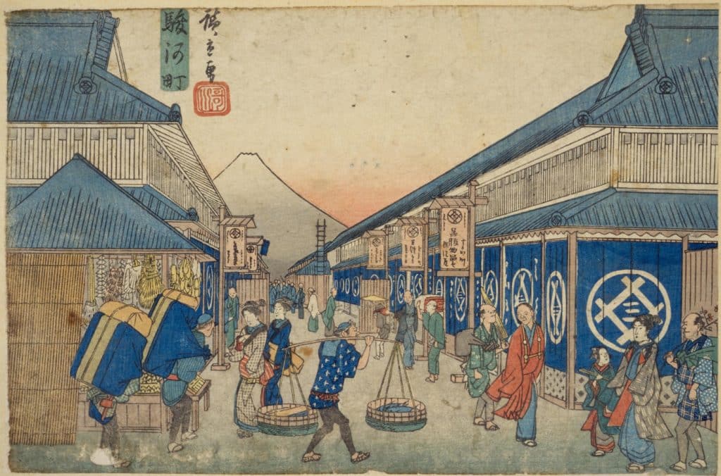 東都名所 駿河町之図という絵で奥には富士山町中にお店が立ち並び、魚売りの男性などの人々の行きかう様子が描かれている絵