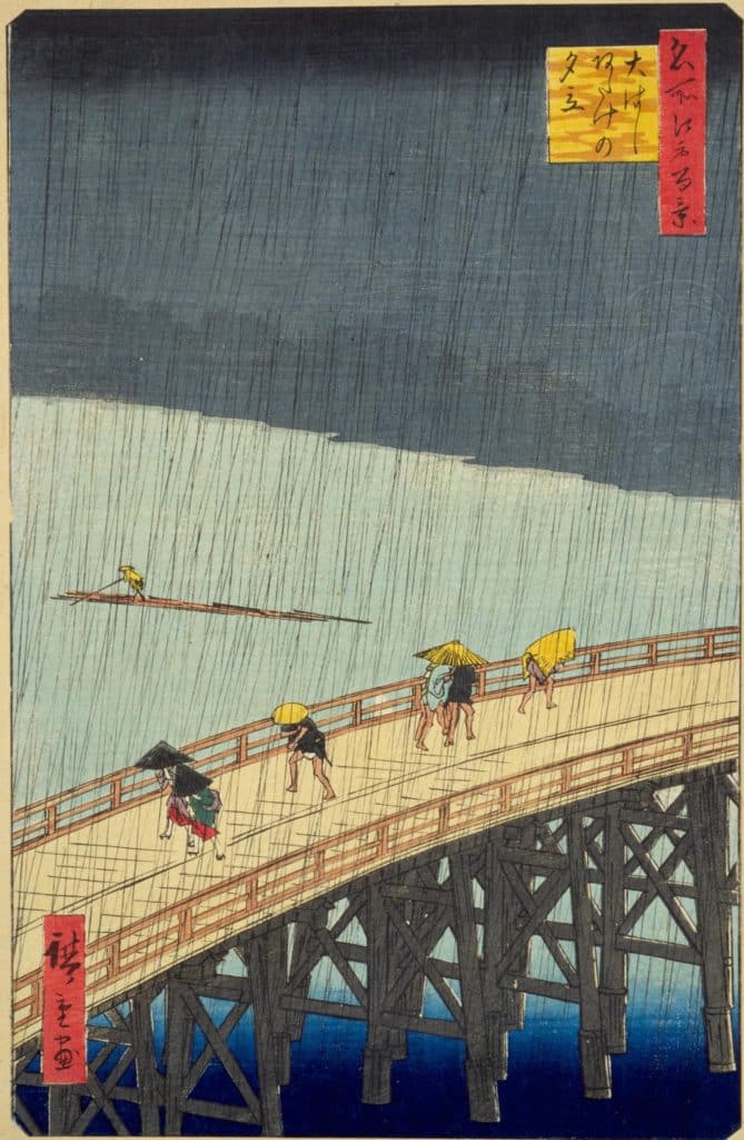 「名所江戸百景 大はしあたけの夕立」は、歌川広重による浮世絵の一つで、1857年に制作されました。この作品は、隅田川にかかる「大はし」（現在の新大橋）を、遠景がぼけるほど激しい夕立に降られながら渡る人々を、西岸から見て描かれています。

画面中央には、橋を渡る人々が描かれており、その背後には激しい雨によってぼけた遠景が広がっています